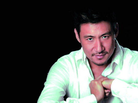 张靓颖张学友合唱世界杯中文主题歌《旗开得胜